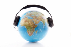 A globe of the earth wearing headphones.  It is possible to soundproof all noise.